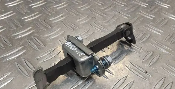 Front door check strap stopper