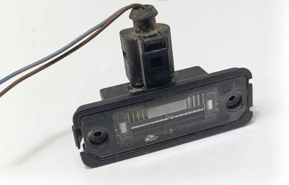Volkswagen Polo IV 9N3 Number plate light 1J6943021B