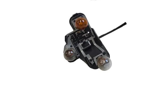 Tail light bulb cover holder