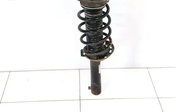 Volkswagen Caddy Front shock absorber/damper 317575