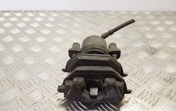 Volkswagen Golf IV Front brake caliper