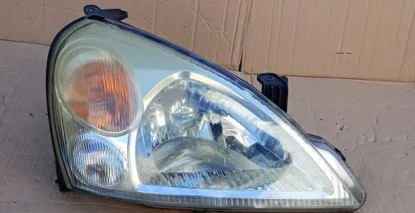 Suzuki Liana Headlight/headlamp 10032662