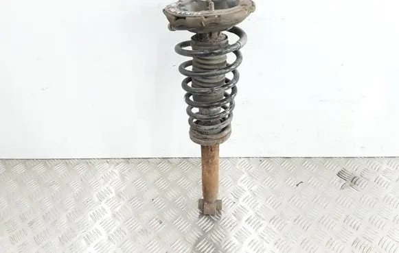 Nissan Primera Front shock absorber with coil spring