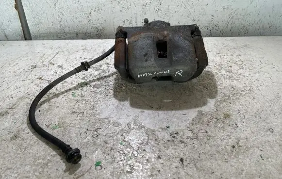 Nissan Maxima A35 Front brake caliper