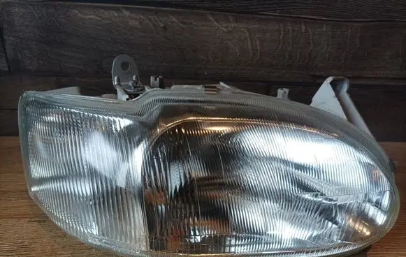 Ford Escort Headlight/headlamp 205035B
