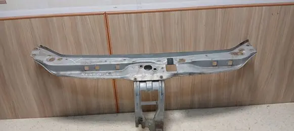 Top upper radiator support slam panel
