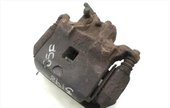 Nissan Juke I F15 Front brake caliper