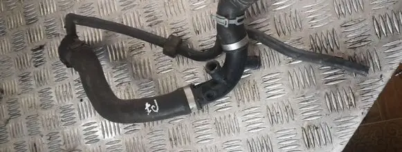 Volkswagen PASSAT B7 Engine coolant pipe/hose 1k0121087s