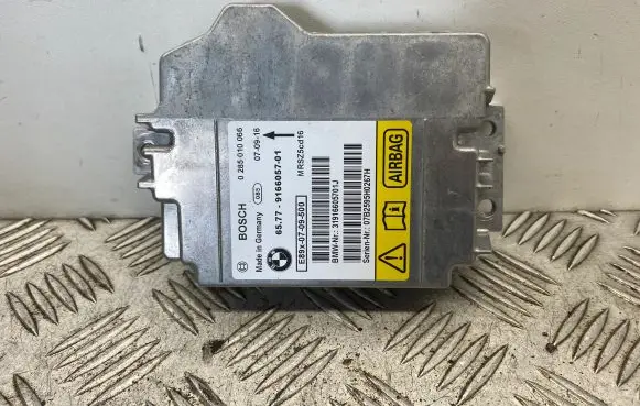BMW 1 E81 E87 Airbag control unit/module 9166057 65779166057