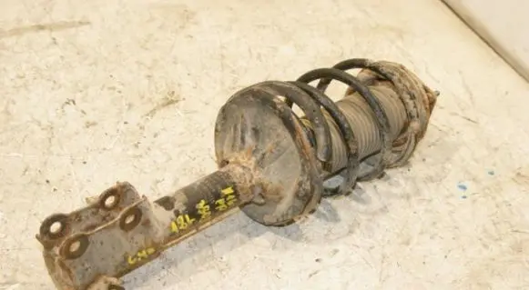 Nissan Almera N16 Front shock absorber with coil spring 54302BM425 54303BN300 54010BM402
