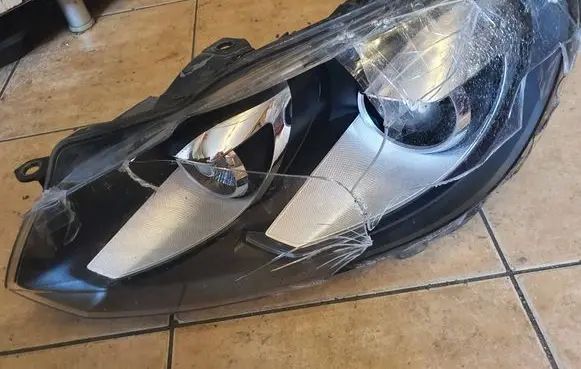 Volkswagen Golf I Headlight/headlamp 5K0941751B 0099020500015059 1ZS00990205