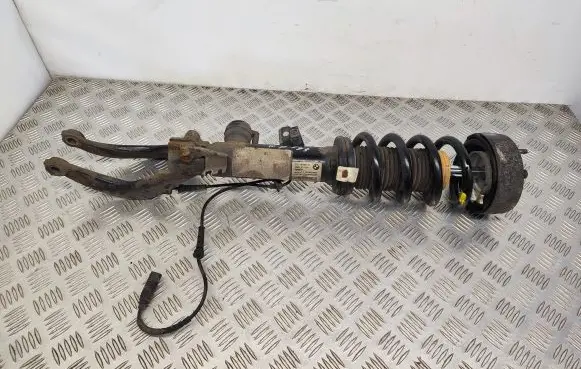 Front shock absorber with coil spring