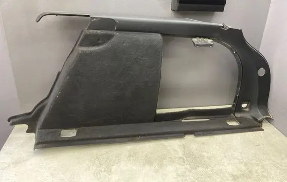 Trunk/boot side trim panel