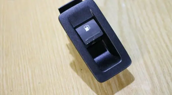 Volkswagen Touran I Fuel tank opening switch 1T0959551 1F0959527