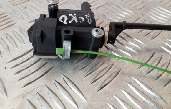 Fuel tank cap lock motor