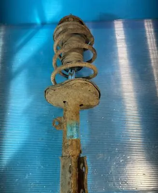 Toyota Corolla E120 E130 Front shock absorber with coil spring