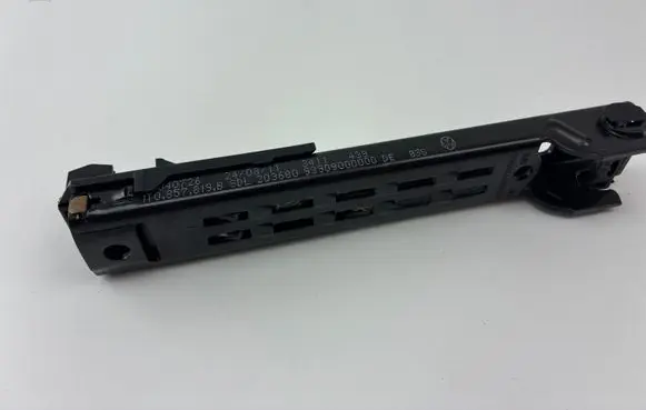 Volkswagen PASSAT B7 Seat belt adjustment rail 1T0857819B