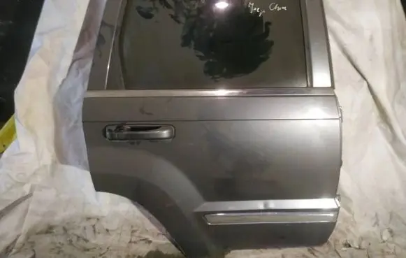 Jeep Grand Cherokee (WK) Rear door pilkos
