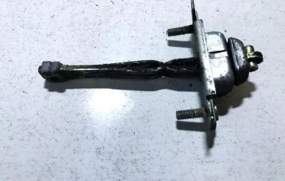 Mazda 323 Rear door check strap stopper