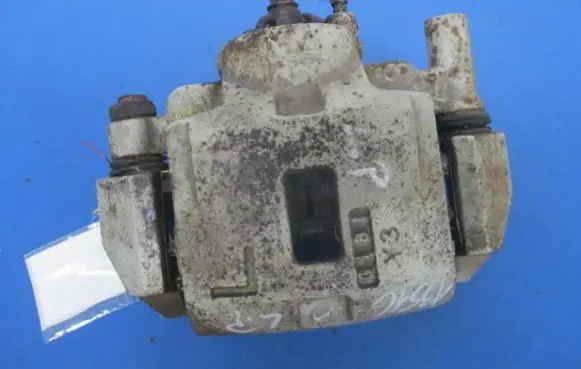 Mazda 323 Front brake caliper