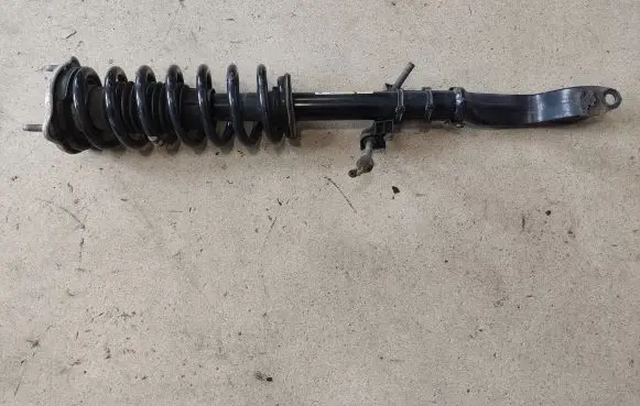 Front shock absorber with coil spring