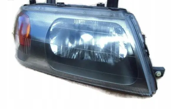 Mitsubishi Pajero Sport I Headlight/headlamp