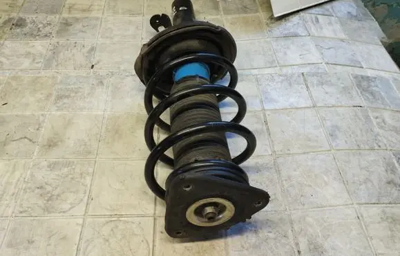 Ford Focus Front shock absorber with coil spring BV6118045AAC