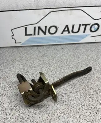 Rear door check strap stopper