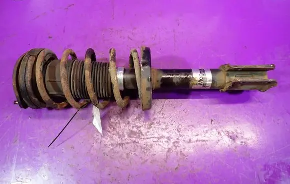 Opel Corsa B Front shock absorber with coil spring 