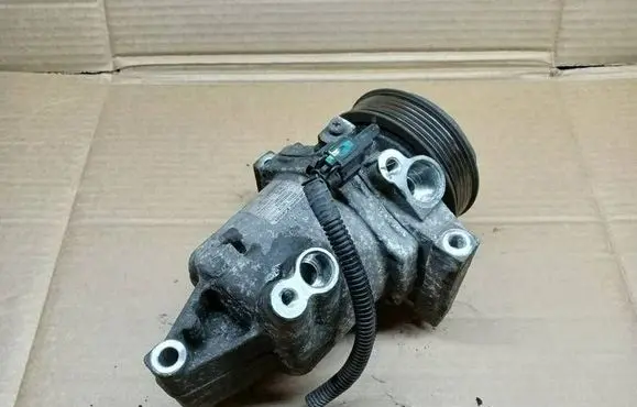 Nissan Micra Air conditioning (A/C) compressor (pump) 926001HC1D 11011261