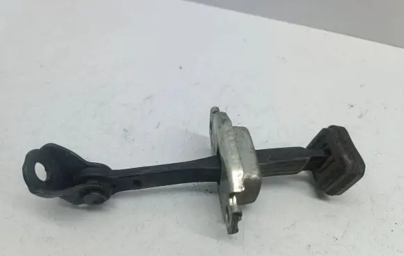 Rear door check strap stopper