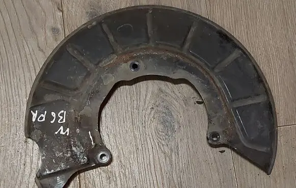 Volkswagen PASSAT B6 Front brake disc dust cover plate 