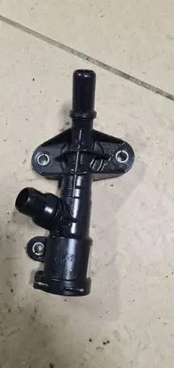 Thermostat/thermostat housing