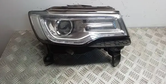 Jeep Grand Cherokee Headlight/headlamp 68144708AF 323524 M167605