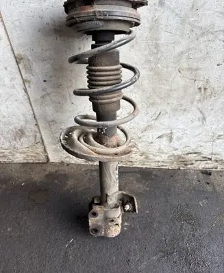 Nissan Micra Front shock absorber with coil spring