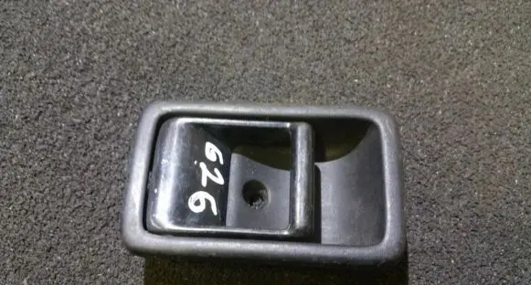 Mazda 323 Rear door interior handle