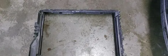 Radiator support slam panel bracket
