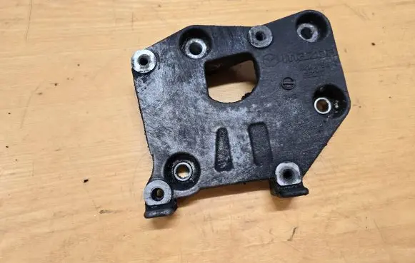 Mazda CX-7 A/C compressor mount bracket R2AA15810 S5227
