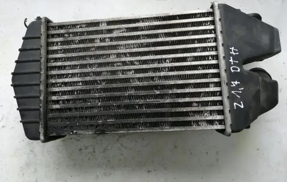 Opel Zafira B Intercooler radiator 13213402