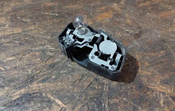 BMW 3 E46 Tail light bulb cover holder 230570R