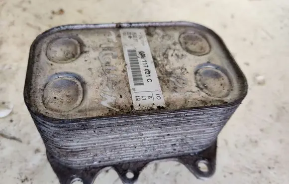 Volkswagen Tiguan Oil filter mounting bracket 03L117021C