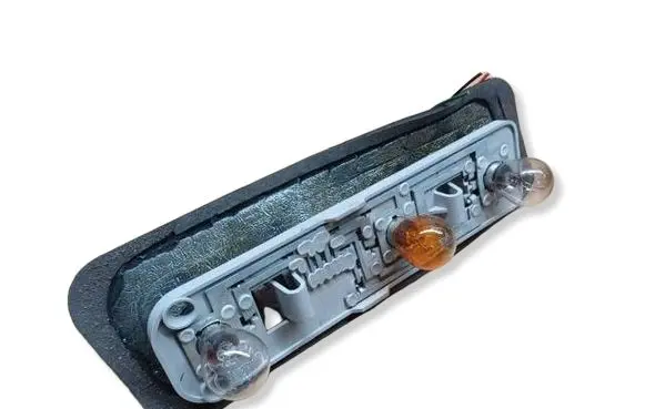 Nissan Micra Tail light bulb cover holder 423000