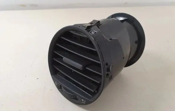 Volkswagen Caddy Dash center air vent grill 2K0819703B