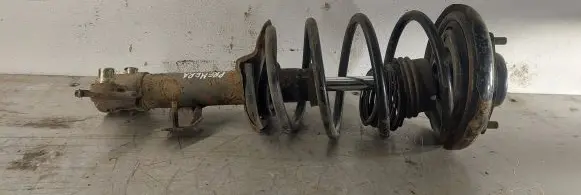 Nissan Primera Front shock absorber with coil spring