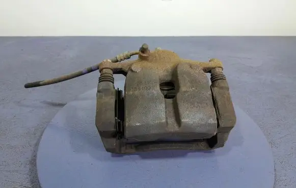 Hyundai Tucson IV NX4 Front brake caliper