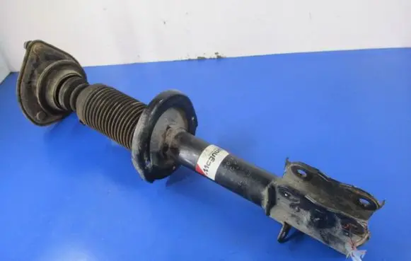 Mitsubishi Colt CZ3 Front shock absorber with coil spring