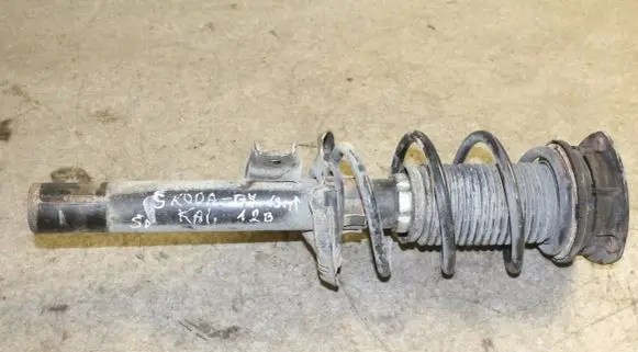 Volkswagen Golf VII Front shock absorber with coil spring 5Q0413023FH