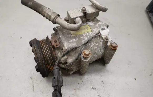 Ford Fiesta Air conditioning (A/C) compressor (pump) YS4H19D629AB