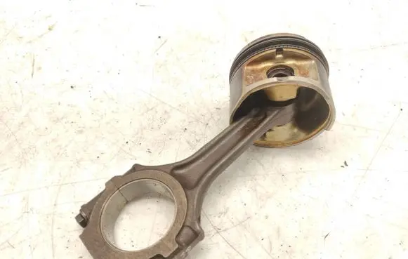 Piston with connecting rod