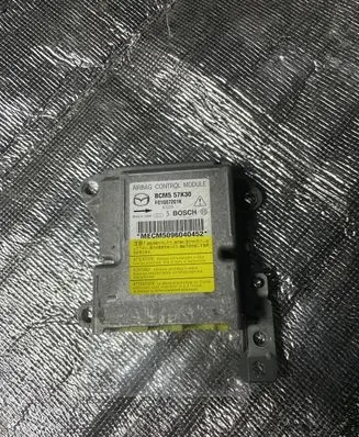 Mazda 3 II Airbag control unit/module BCM557K30